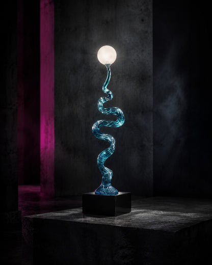 BLUE VENOM — Drop 029 teal serpent globe light in a dark gallery